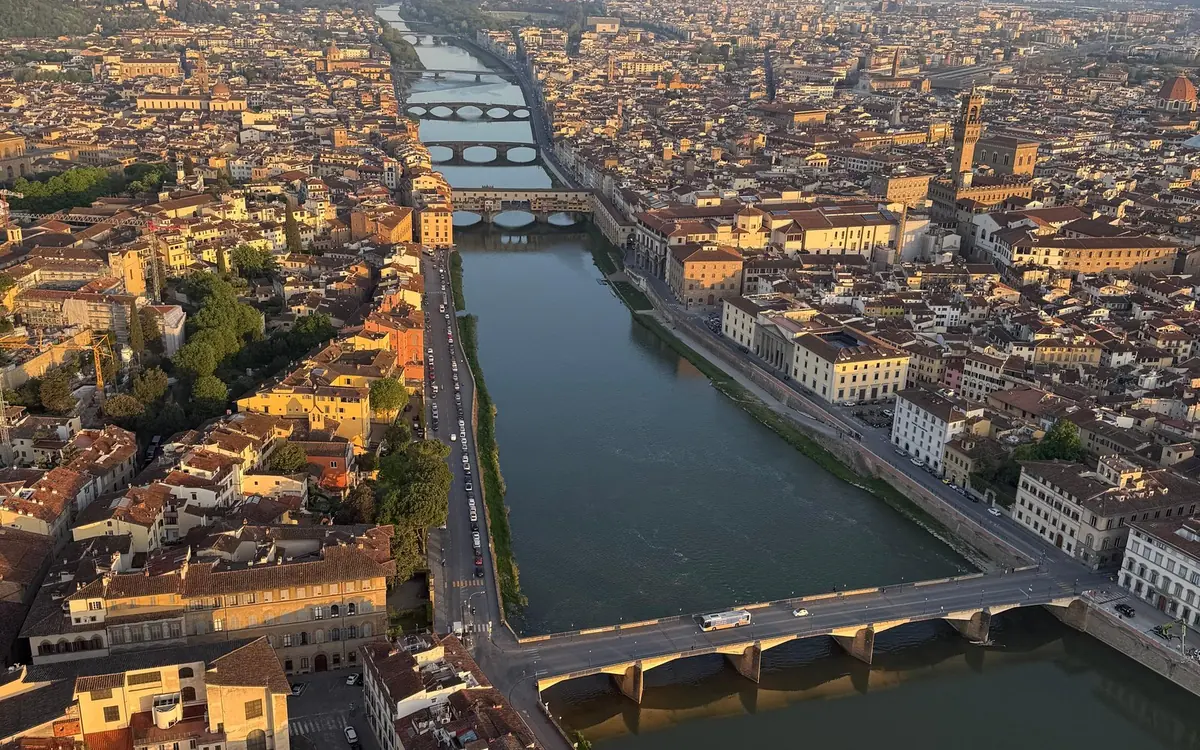 Florence seen from high above, with the river and the bridges crossing it